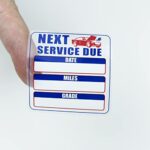 Oil Change Stickers 250 Pcs Per Roll-Service Reminder Stickers-2 inches x 2 inches Premium Clear Stock-Windshield Stickers-Checkered Flag- Peel & Write and Stick with No Residue Car Sticker